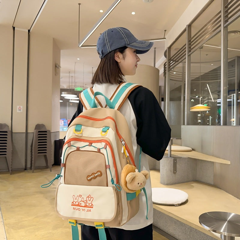 New large-capacity backpack simple female college student lightweight fashion backpack junior high school student schoolbag