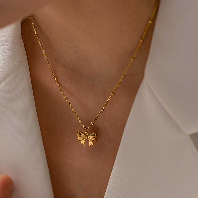 Wholesale bowknot necklaces - new european and american cross-border jewelry, niche light luxury necklaces, simple and versatile alloy pendants for women