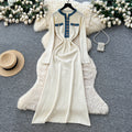 French chic color block knit dress with metal buckle detail - round neck, long sleeves, and cinched waist
