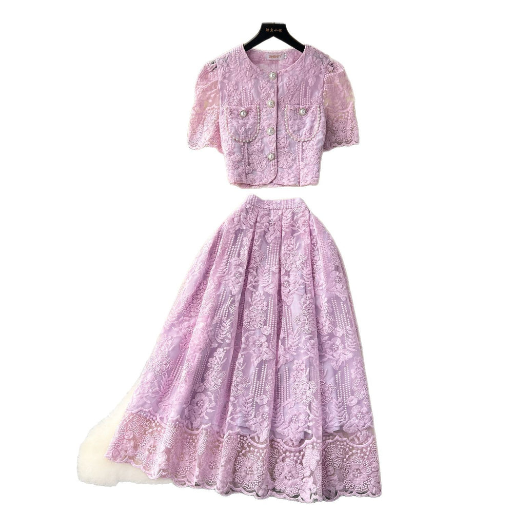 High-end, sophisticated, and feminine two-piece set for women. features a french-style lace crochet blouse with puff sleeves and a high-waisted, slimming midi skirt