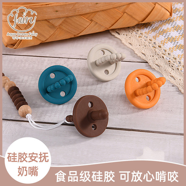 Wholesale silicone pacifier, grinding teeth and chewing silicone pacifier, teething glue baby coaxing baby silicone bite Le manufacturer
