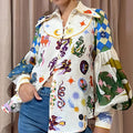 cross-border european and american women's clothing: new summer collection - graffiti print, turn-down collar, lantern sleeve, loose fit, slimming long-sleeve shirt