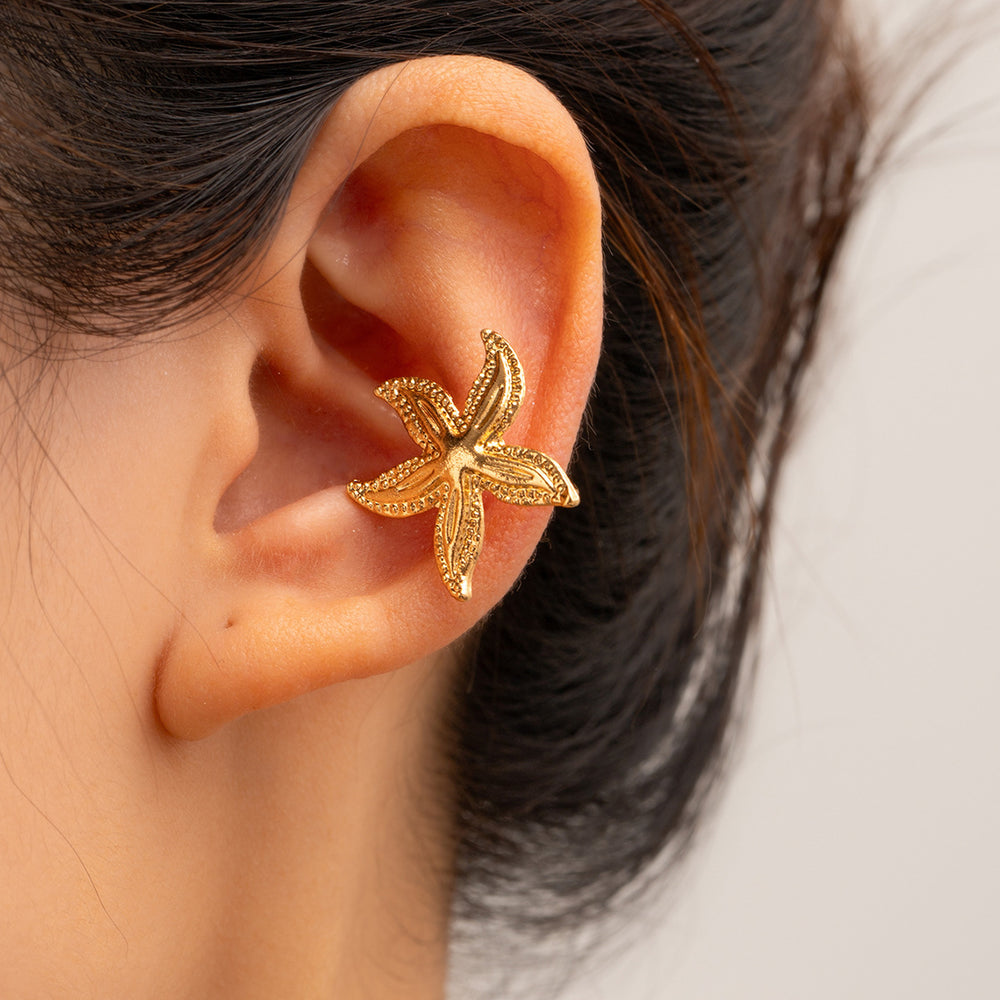 Gold earrings wholesale 2025 new european and american cross-border alloy jewelry niche accessible luxury starfish earrings women's ear cuff