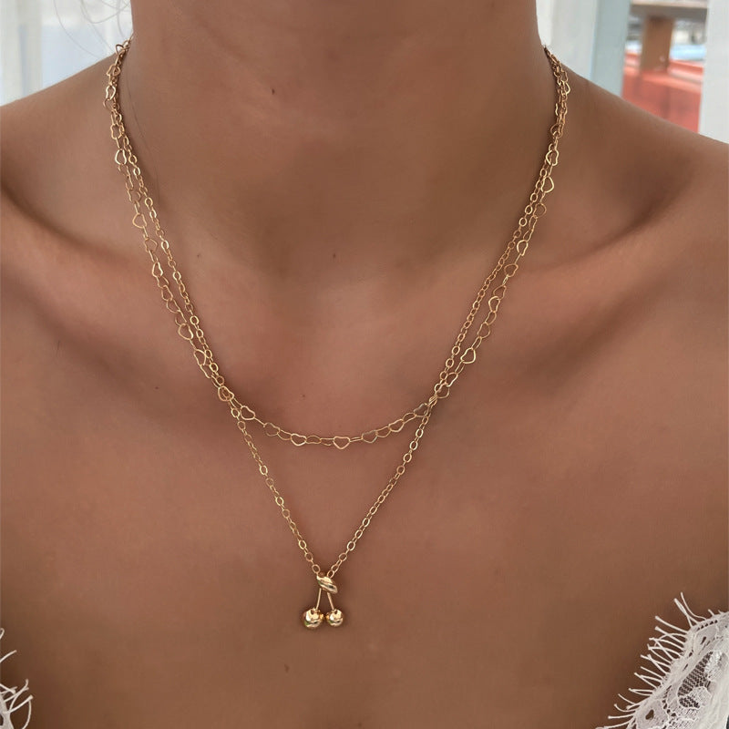 Wholesale autumn/winter necklaces: european and american style cute cherry alloy rhinestone pendant, versatile high-end gold-plated women's choker necklace