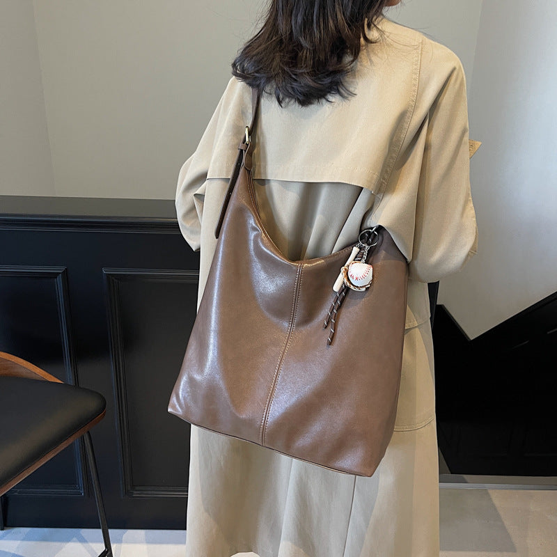 Casual commuting retro large-capacity bag women's 2025 new winter and winter shoulder bag college students class tote bag