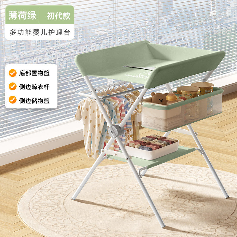 Baby changing table - newborn diaper changing, bathing, massage, and bed - foldable multifunctional baby bed