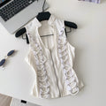 French chic ruffle trim top - women's designer sleeveless chiffon blouse with exquisite rhinestone embellishments and halter neck detail. a unique and elegant piece