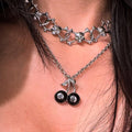 Wholesale necklace accessories: european & american cross-border jewelry - minimalist black cherry & billiard ball pendants, skull necklaces