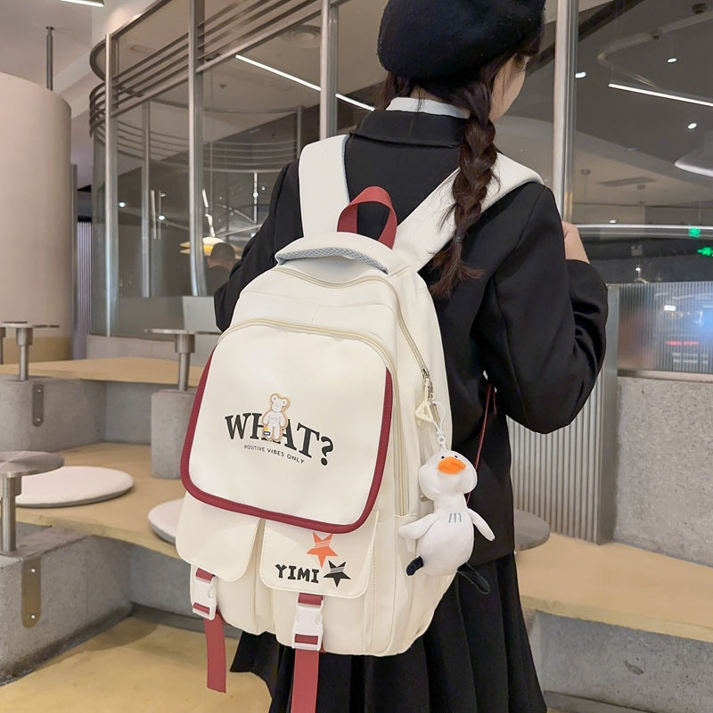 School bag for female junior high school students, large-capacity Japanese backpack for primary school students, third to ninth grades to reduce the burden and protect the spine, fashionable backpack