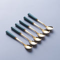 Gray blue gold spoon