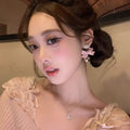 Pink bowknot dangle earrings - luxury, elegant, and exquisite for the modern woman