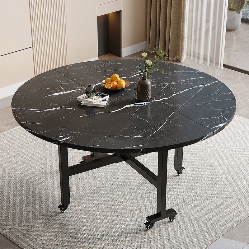 Folding dining table - round, multi-functional, portable, and wheeled - perfect for small spaces