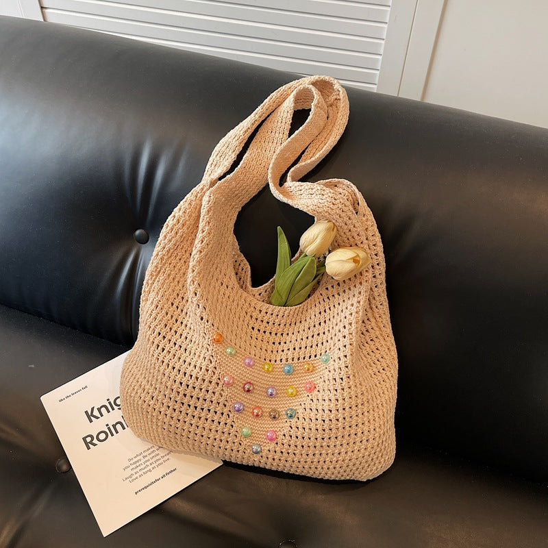 Seaside commuter shoulder tote bag vacation woven bag women's summer colored pearl hollow large capacity underarm bag women