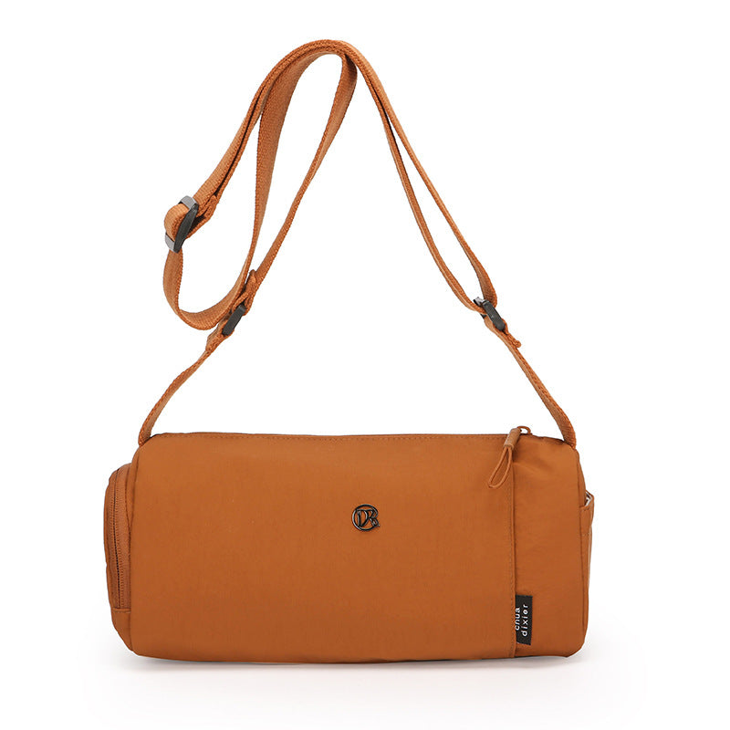 Simple Japanese shoulder bag women's nylon anti-splashing cylinder pillow bag trendy cool messenger bag commuter portable handbag