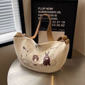 Niche style canvas bag for women 2024 spring and summer new arrivalcasual large capacity student shoulder work clothing bag crossbody dumpling bag
