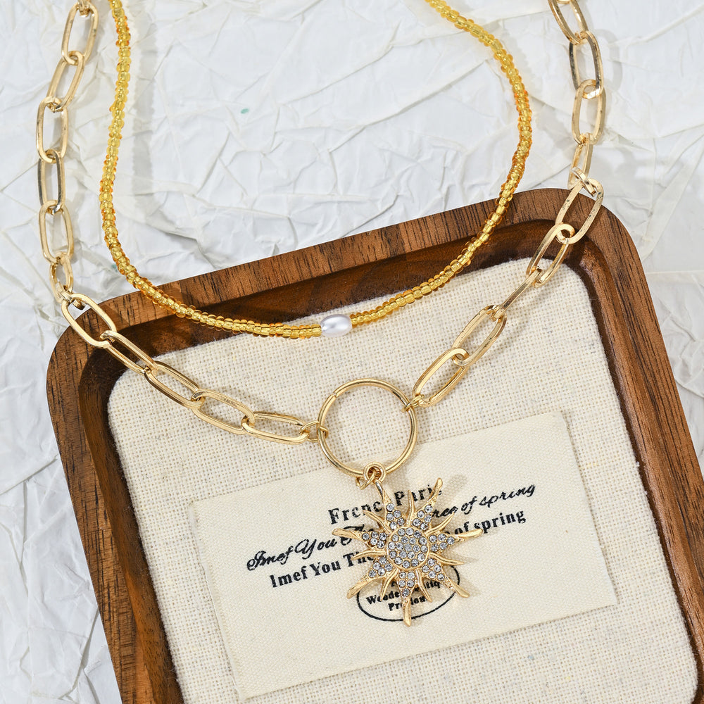 European and american cross-border sunflower pendant necklace - women's light luxury, high-end, diamond-studded geometric sweet & cool beaded choker necklace wholesale