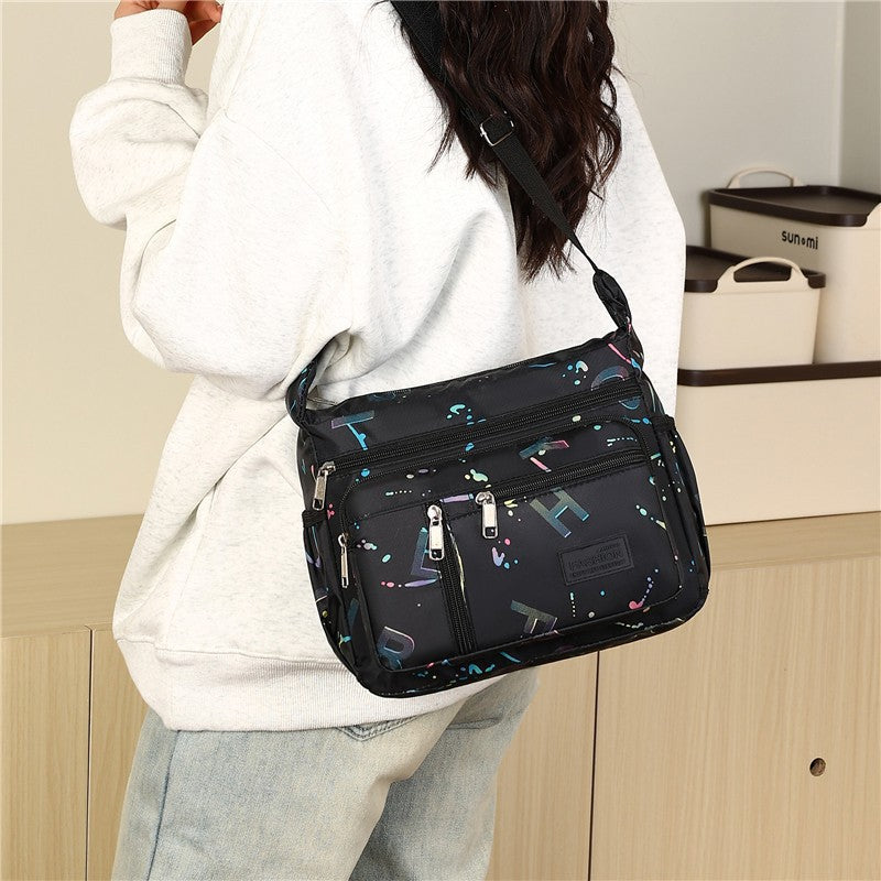 New fashionable versatile shoulder bag large capacity letter printing leisure travel messenger bag multi-layer storage mother bag