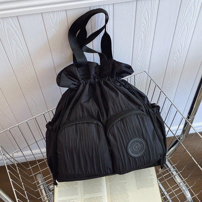 Cross-border college style high-value large-capacity backpack women's 2025 new niche pleated drawstring shoulder bag