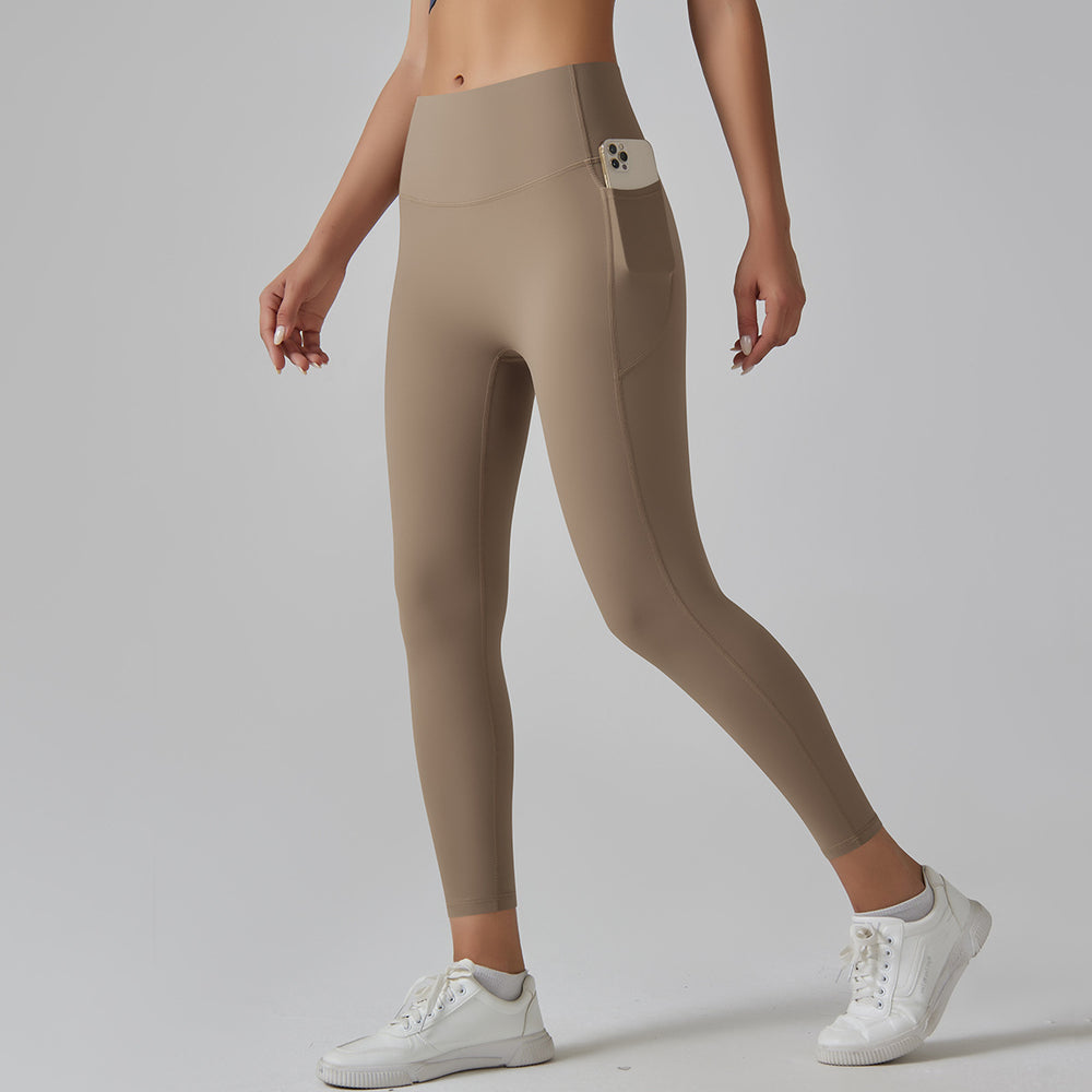 High-waisted, barely-there yoga pants for women. seamless, quick-drying, compression leggings with pockets, perfect for running, fitness, and sculpting your figure. brushed fabric for extra comfort. ideal for yoga and other workouts