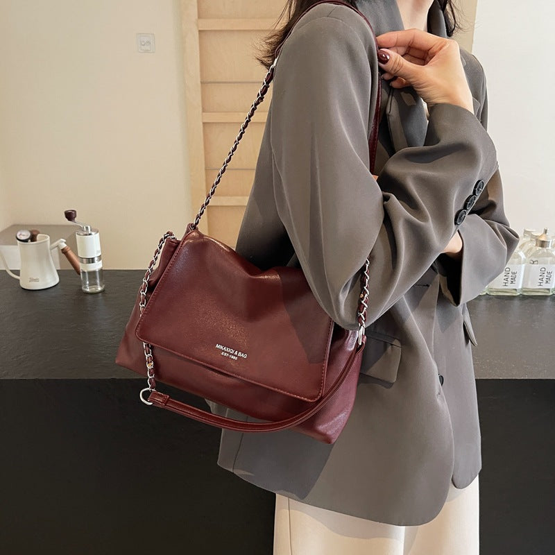 Solid color simple large-capacity foreign gas bag women's 2025 new trendy underarm commuter chain single shoulder tote bag