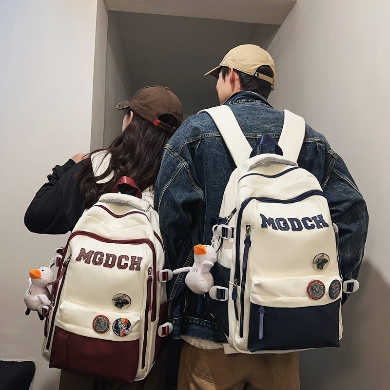 New middle and high school students backpack large capacity lightweight weight backpack simple and strong anti-splashing backpack