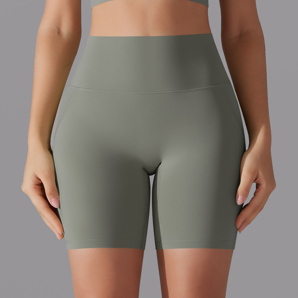 Naked-feel, high-waisted, butt-lifting yoga shorts – perfect for running, fitness, and a custom-made, three-quarter length fit. sampling and oem manufacturing available