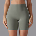 Naked-feel, high-waisted, butt-lifting yoga shorts – perfect for running, fitness, and a custom-made, three-quarter length fit. sampling and oem manufacturing available
