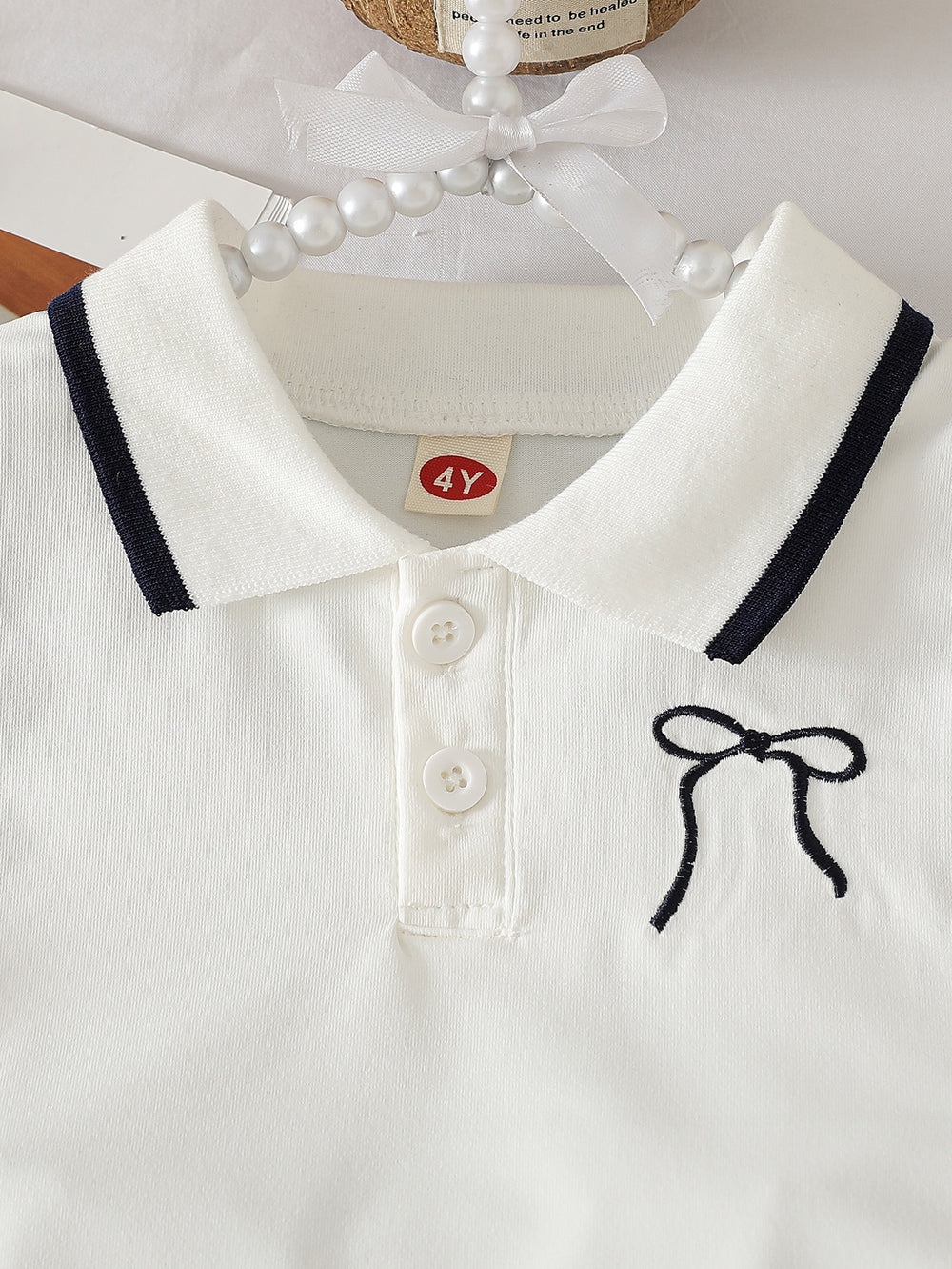 spring/summer new arrival: cross-border girls' polo shirt with bow + a-line pleated skirt two-piece set