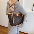 2025 new cross-border women's bag: large capacity, versatile tote, underarm bag, commuter bag, export quality, textured mommy bag