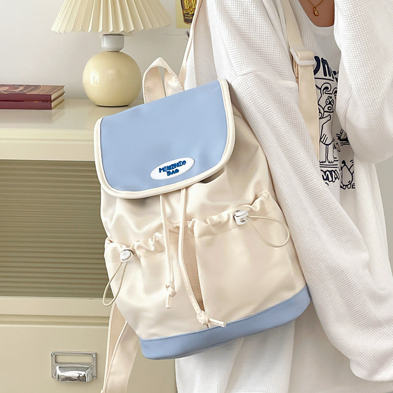 Summer new splicing contrasting color backpack 2025 bag cover design Mori niche leisure backpack going out travel bag