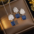 popular cubic zirconium flower titanium steel necklace women's earrings niche design high-end sense of light luxury inlaid zirconium suit jewelry