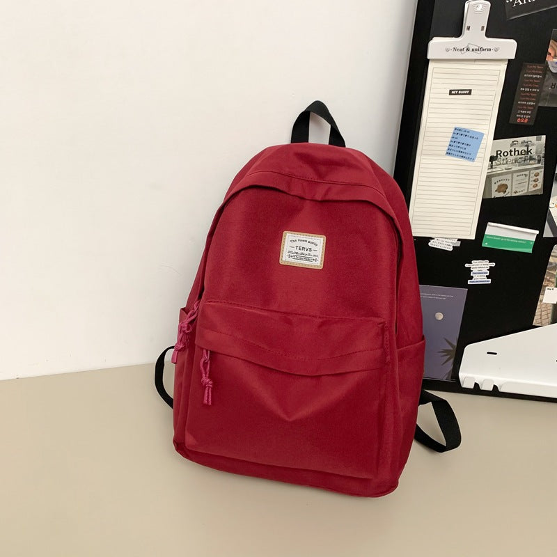 New fashion simple trend backpack large capacity lightweight travel backpack Korean version of junior high school student schoolbag