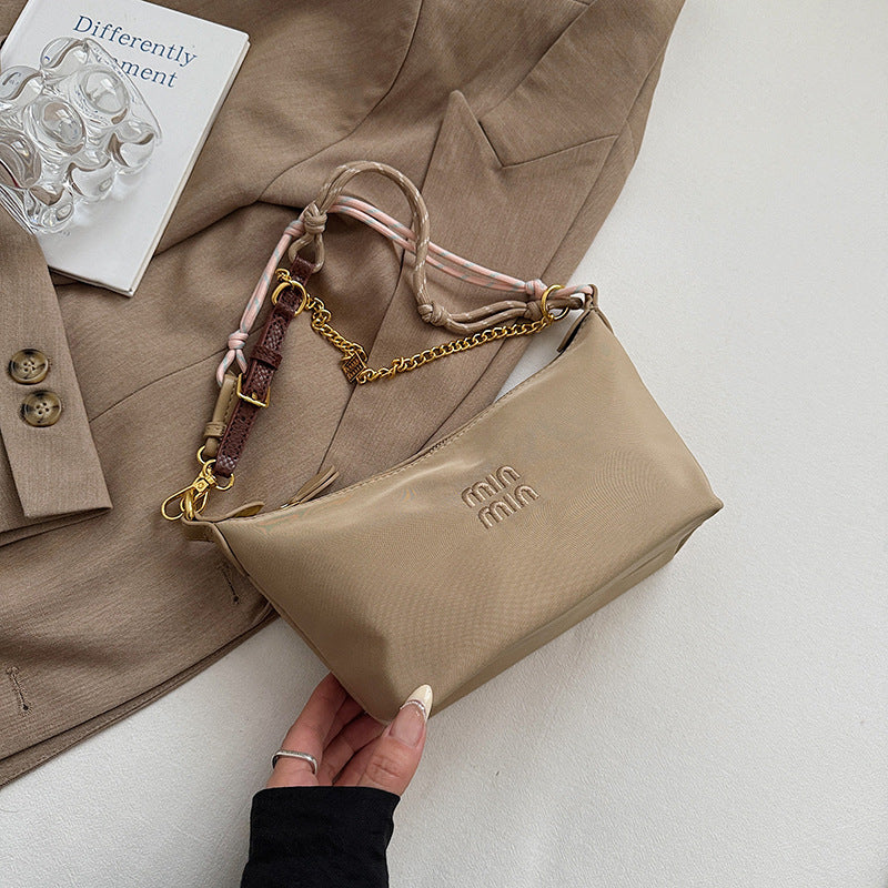 Internet celebrity trend shoulder bag 2025 summer new contrasting color canvas small lunch box bag commuter fashion trend handbag