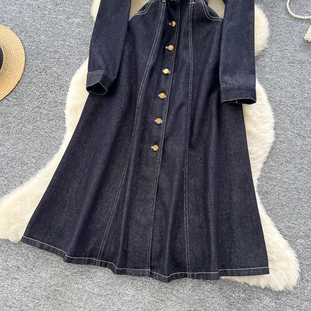 French retro chic, high-end denim dress with metal buckle collar, long sleeves, single-breasted button closure, and tie-waist detail