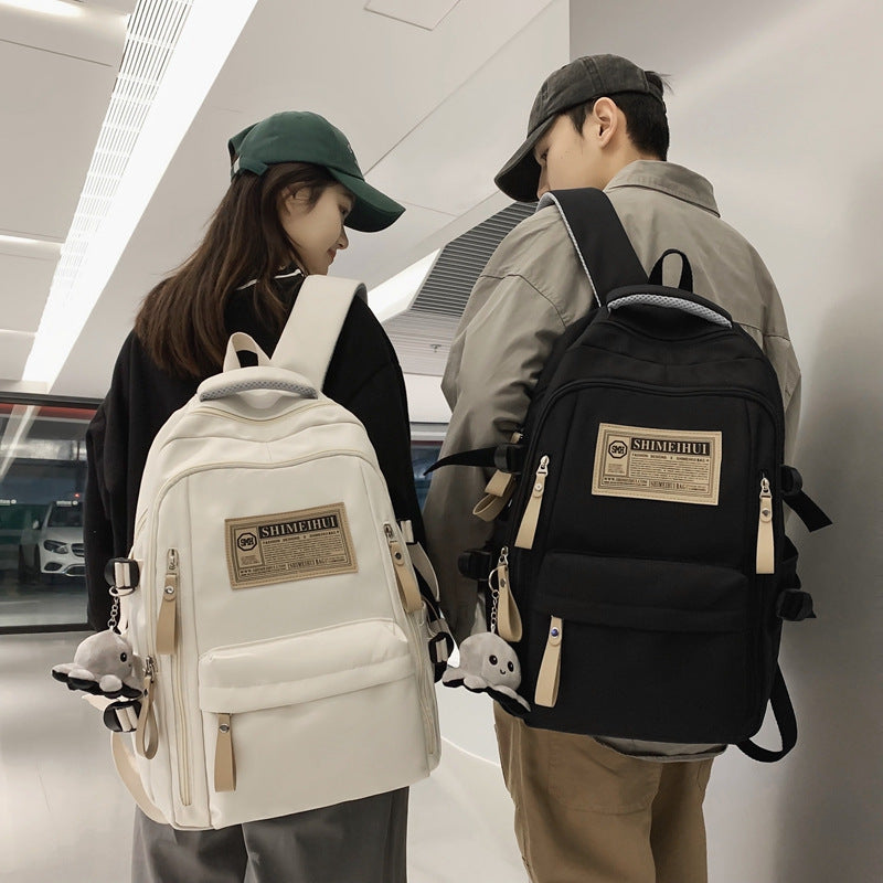 Spring and summer simple travel backpack computer backpack casual solid color ultra-light junior high school students large-capacity schoolbag
