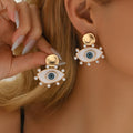 Wholesale devil's eye earrings - european & american style, chic, unique, high-end, statement pearl studs & earrings for women