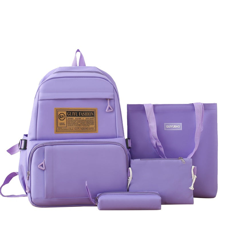 New primary and junior high school student schoolbag portable make-up bag four-piece Korean version simple backpack trendy campus backpack