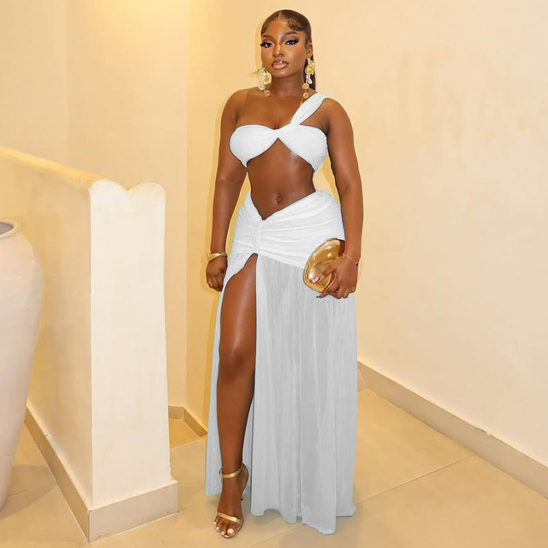 Fashion styleexportpure color vacation navel-baring design skirt suit slit hip-covering chest-wrapping one-shoulder two-piece set women's clothing trend