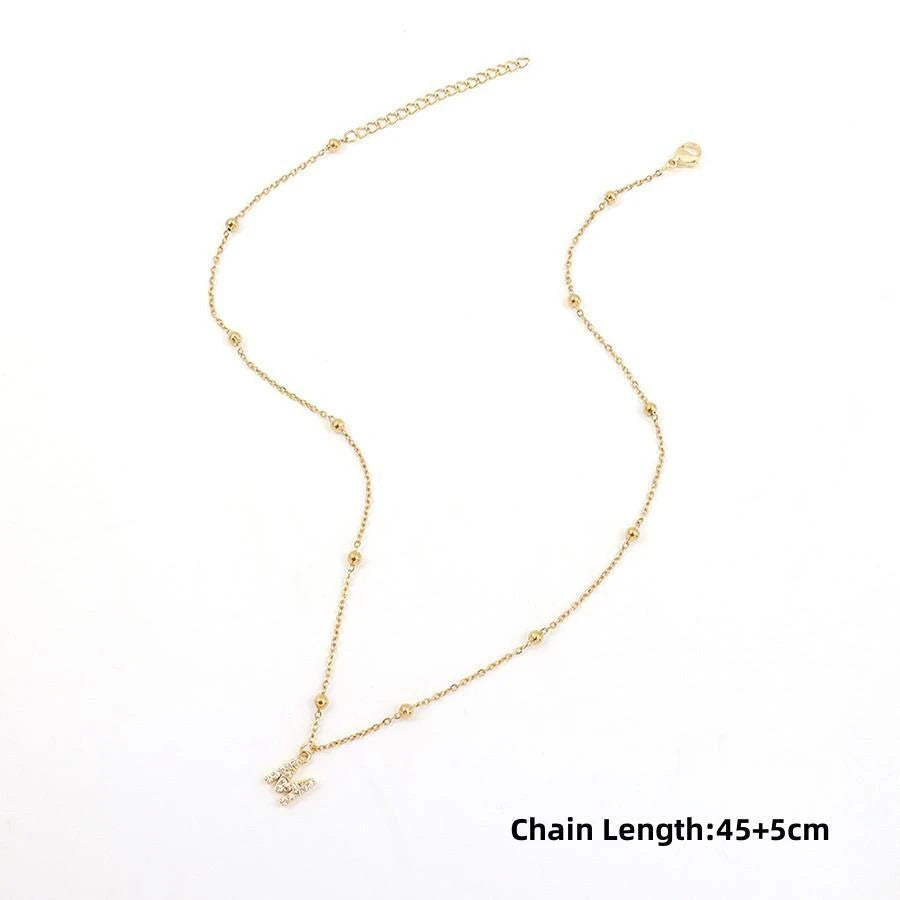 Fashion cross-border accessible luxury diamond-encrusted 26-letter necklace fashion copper micro-paved zircon pendant stainless steel ball necklace