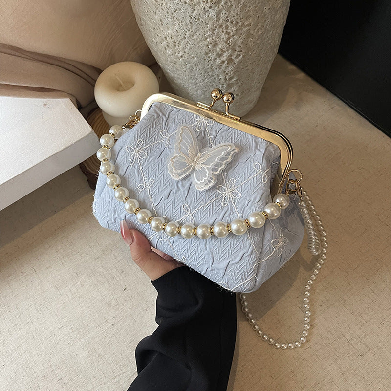 Foreign trade new Chinese embroidery small bag women's 2025 summer new fashion pearl chain mouth gold bag versatile messenger bag