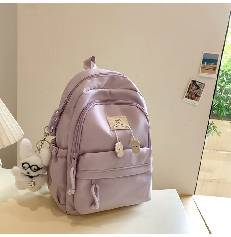 School bag female college student Korean version ins solid color simple and versatile junior high school student travel small backpack high school student backpack