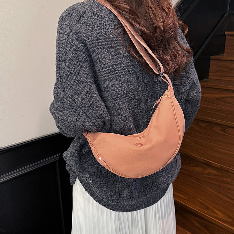 Spring casual macaron color dumpling bag 2026 new versatile crossbody bag women's korean style commuter shoulder bag