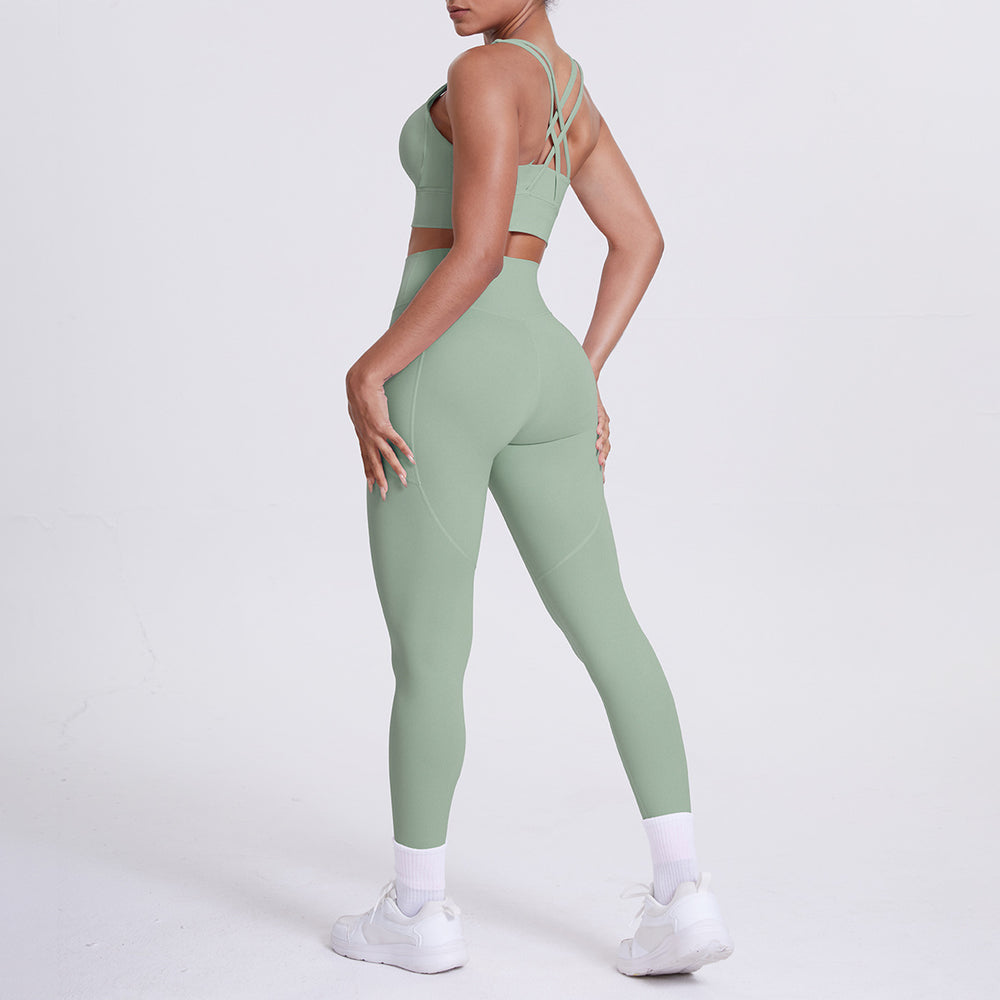 New arrival cross beautiful back cloud sense tight yoga suit suit women's high waist hip pocket sports fitness suit two-piece set