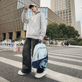 Student backpack - curved design, stylish and spacious. perfect for middle school, high school, and college students. ideal for travel, commuting, and everyday use. multifunctional and trendy