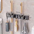 Bathroom bathroom punch-free strong mop wall hanging clip handy gadget fixed hook buckle broom storage storage rack