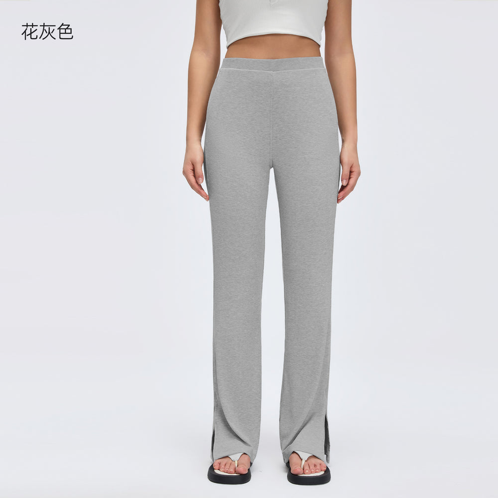Sand-washed ribbed yoga pants for women, loose-fitting, with a flattering drape and slimming effect. wide-leg, slightly flared, with a slit detail. perfect for sports and fitness. style d26024