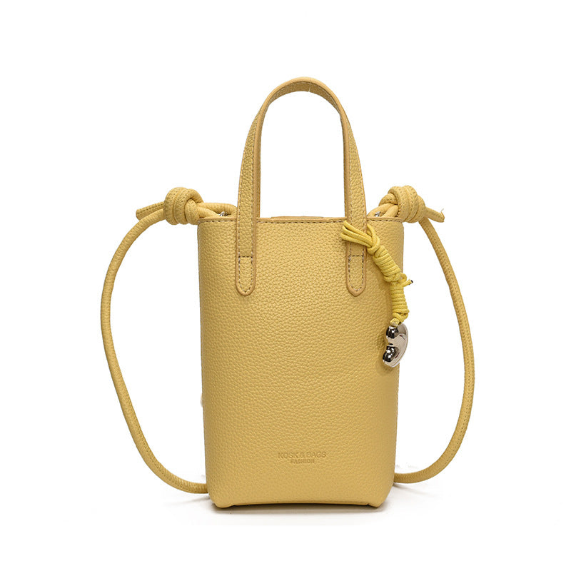 Casual simple niche portable bucket bag women's 2025 new fashion shoulder bag commuter messenger mobile phone bag