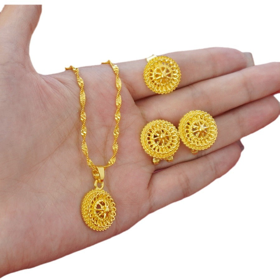 Wholesale cross-border middle eastern hollow design gold-plated necklace, pendant, earrings, and ring three-piece jewelry set