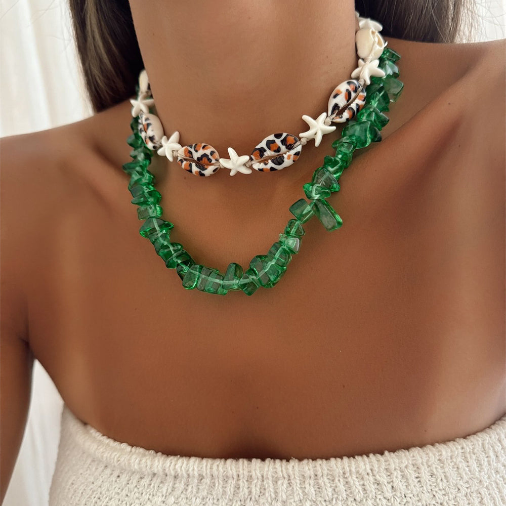 Wholesale seaside necklaces: european and american cross-border ocean-inspired statement jewelry featuring exaggerated shell pendants, light luxury, niche designs, and dyed crushed stone accents for women