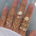 European and american cross-border fashion camellia flower ring set - niche, light luxury, high-end, diamond-studded heart and butterfly finger rings for women
